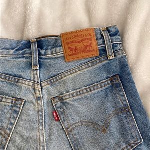 Levis shorts, distressed detail, light/medium wash